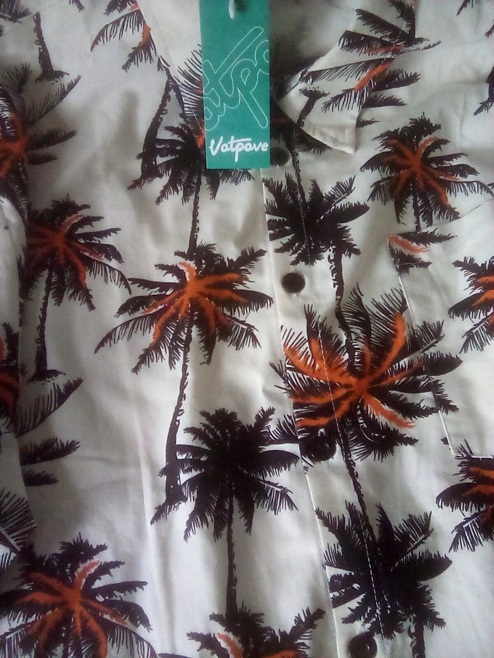 Fabric with palm tree pattern and Volcom tag