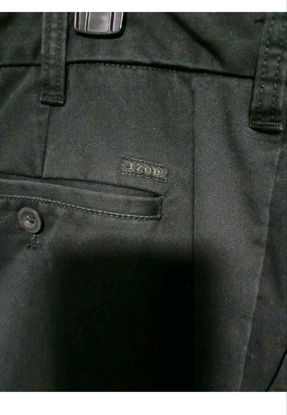 black pants with a brand label on the pocket