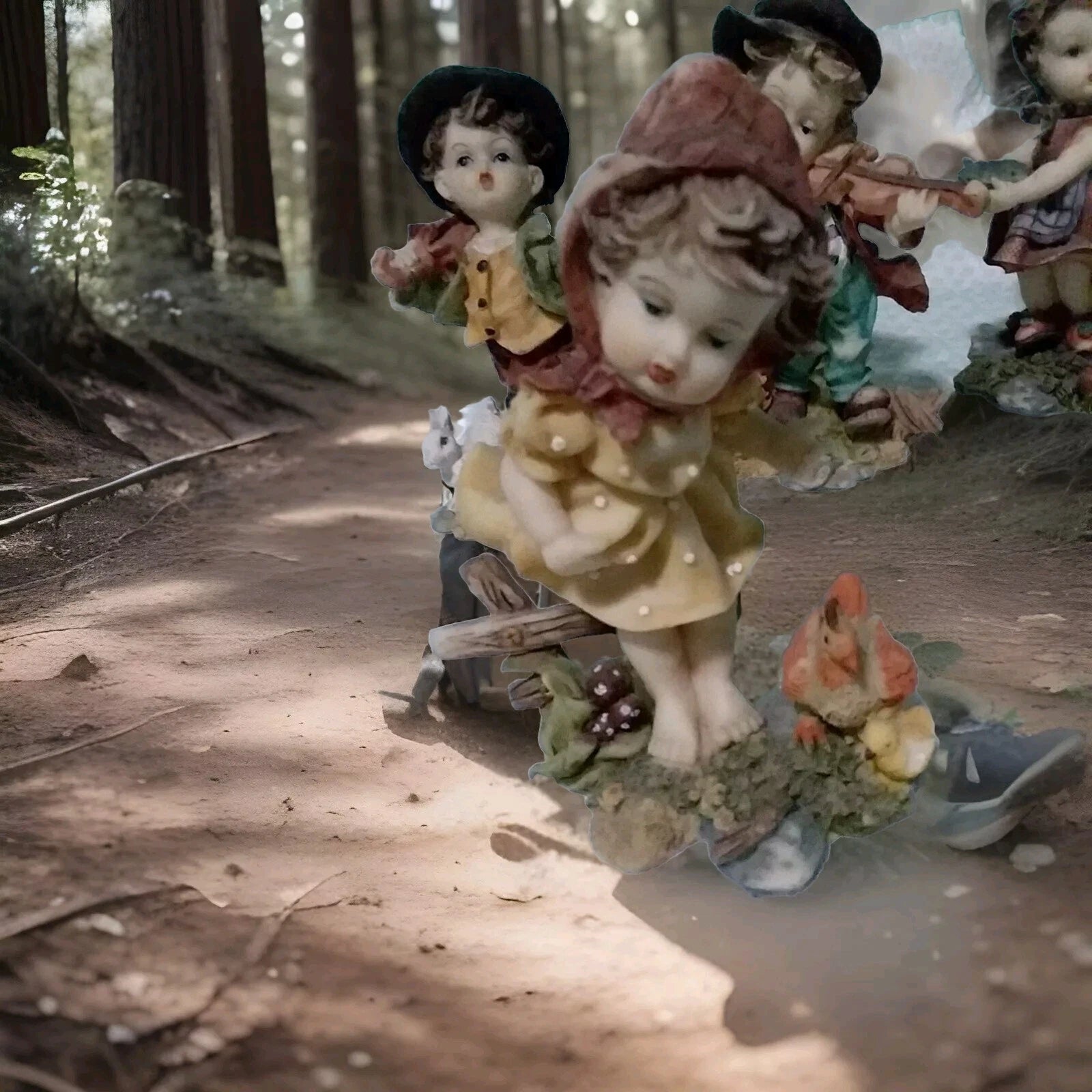 Vintage-style figurines on a forest floor with natural lighting