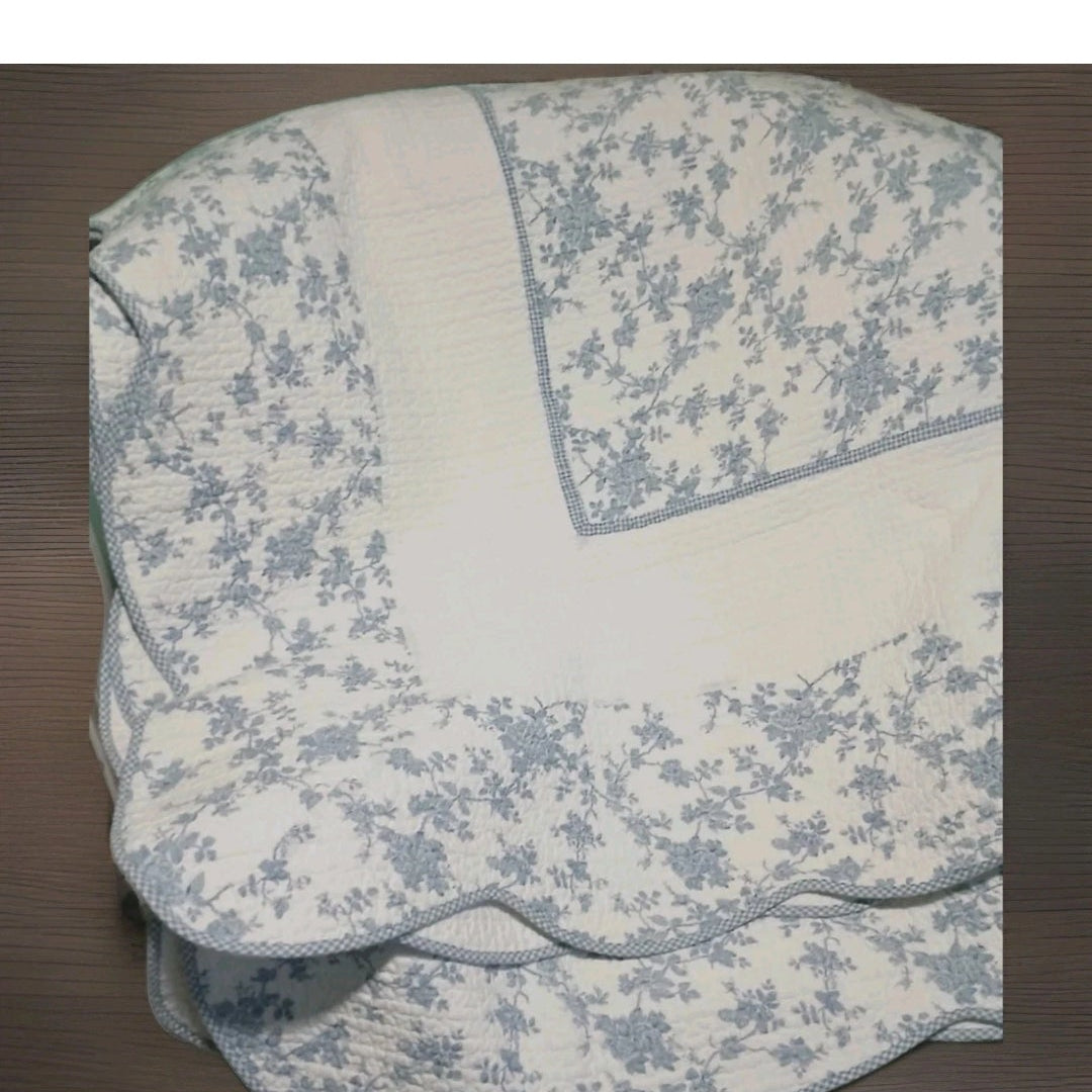 Floral-patterned fabric on a wooden surface