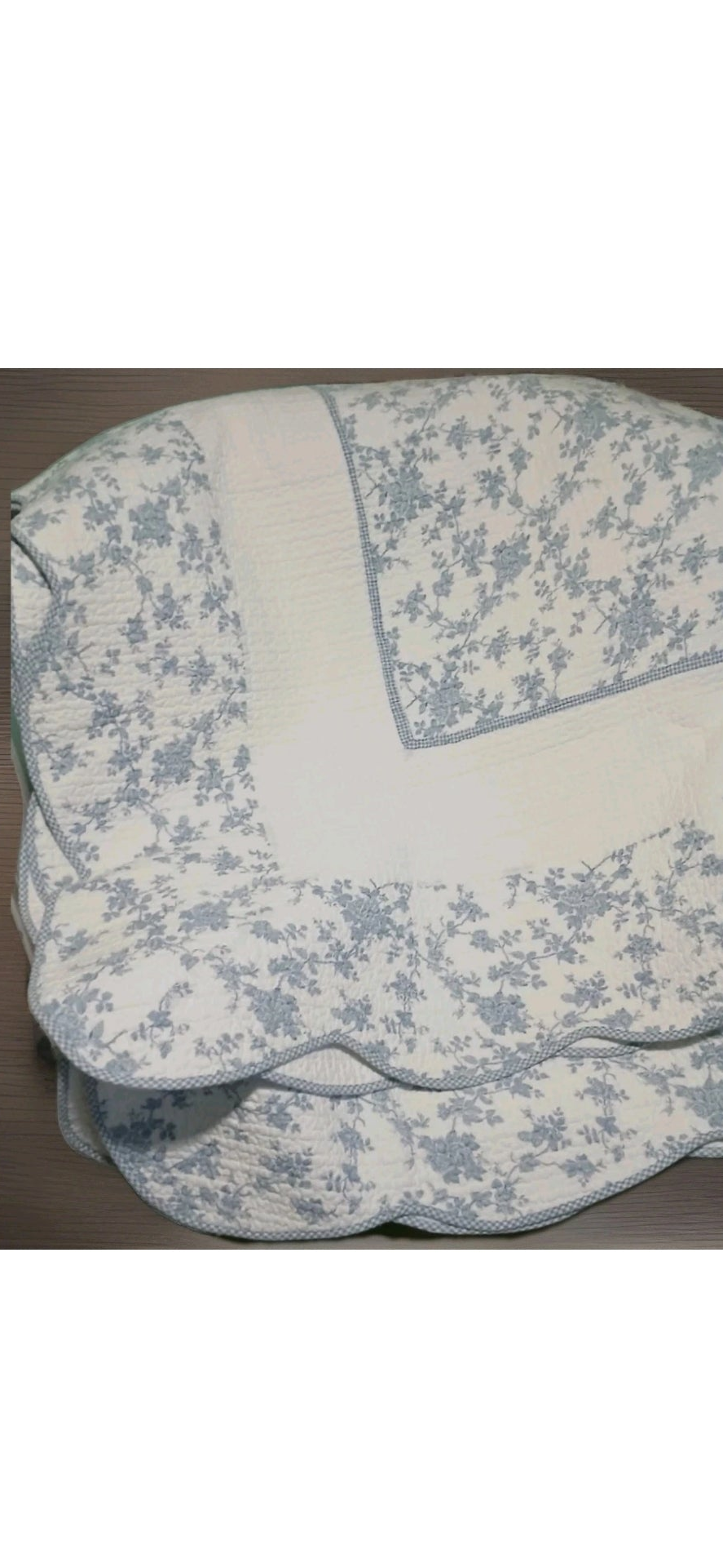 Floral-patterned fabric on a wooden surface