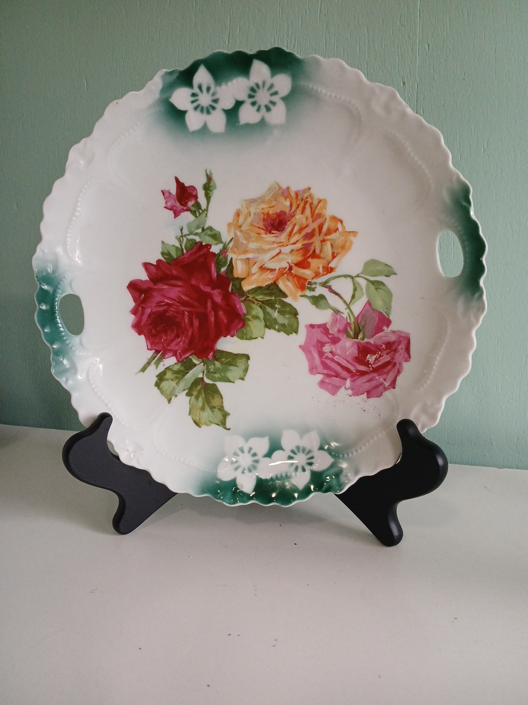 Decorative plate with floral design on a white surface