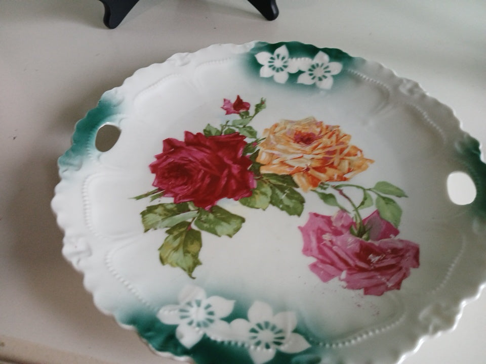 Decorative plate with floral design on a white surface